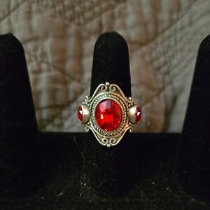Elegant Silver Tone Ring with Faux Bright Red Gemstones